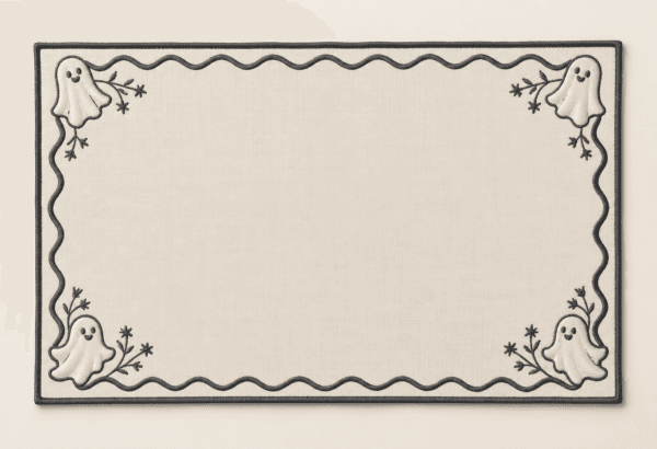 Ghost Scallop Placemat in cream and charcoal — design visualization