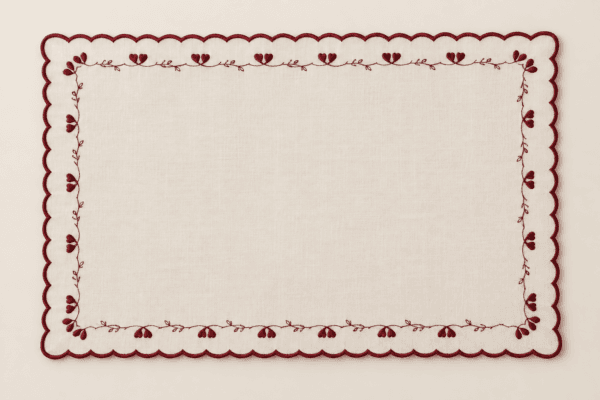 Berry Scallop Placemat in ivory and burgundy — design visualization